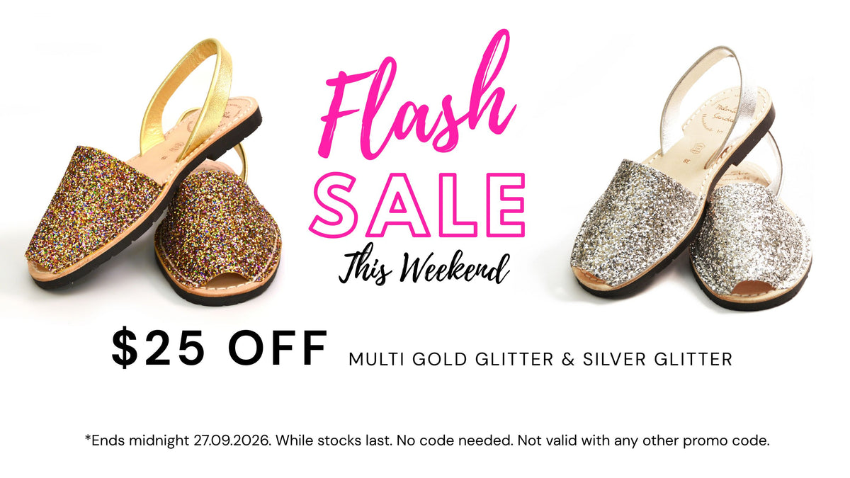 Promotional sale graphic for glittery slingback slide sandals, showing a pair of gold glitter sandals on the left and a pair of silver glitter sandals on the right, with large pink text reading 'Flash SALE This Weekend' and '$25 OFF'.