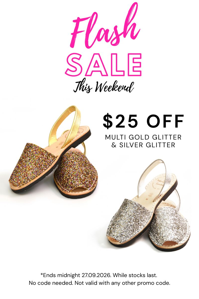 Promotional graphic for a flash sale featuring two pairs of glittery slide sandals on a white background. One pair is gold glitter with a gold heel strap, and the other is silver glitter with a silver heel strap.