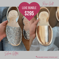 Pair of silver glittery shoes held by hands with a 'Luxe Bundle' text overlay.