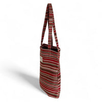 Striped handbag on a white background