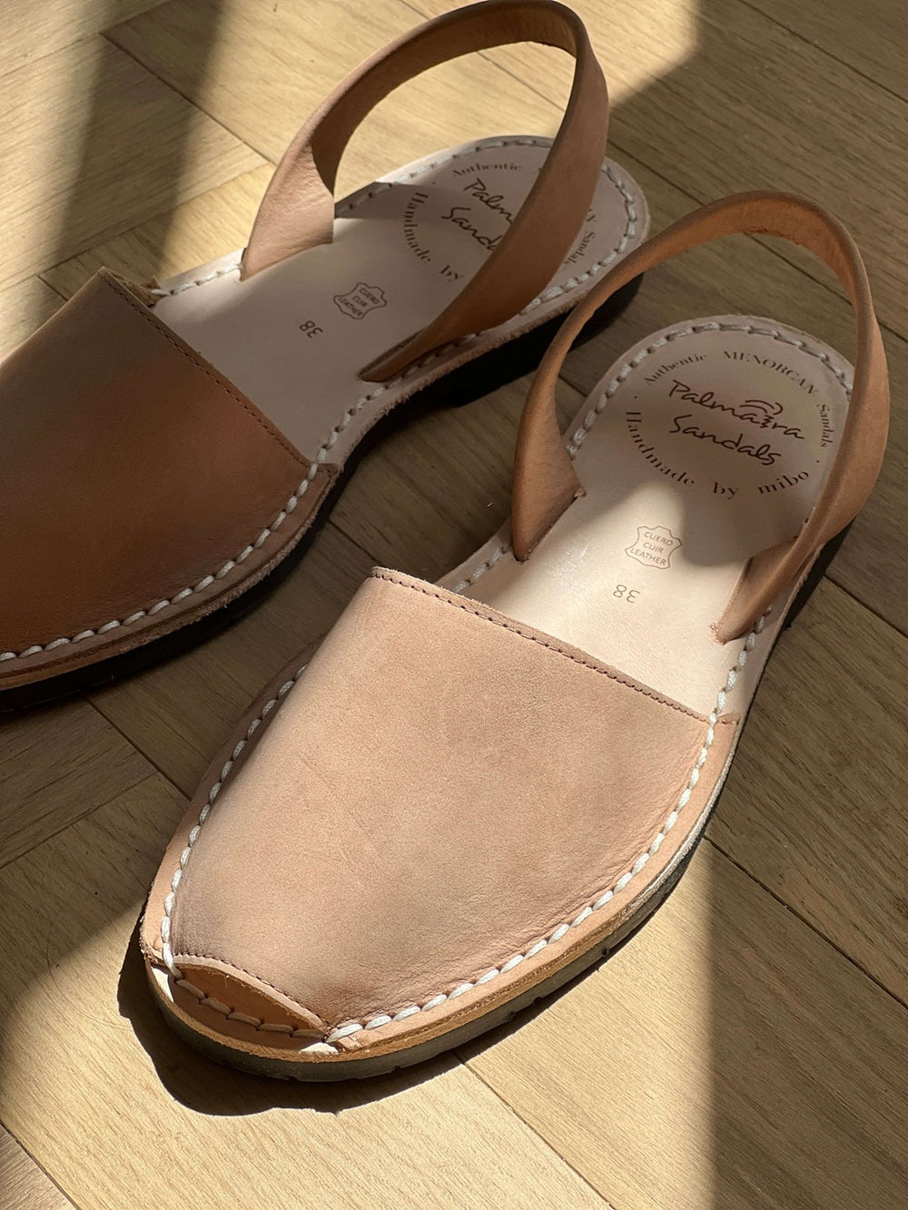 tan sandals in the sunlight